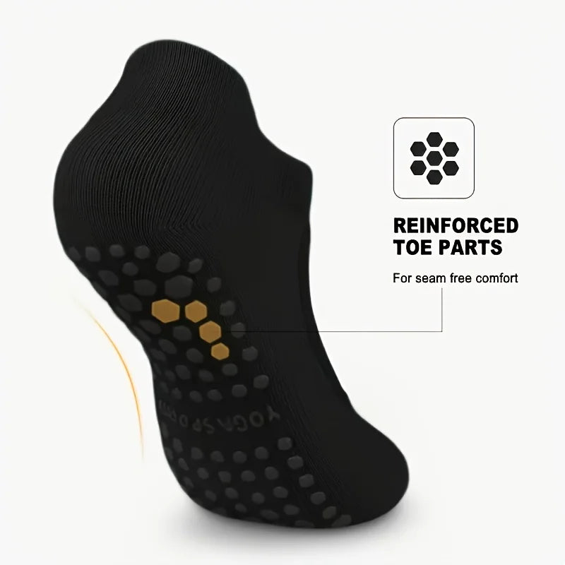 Black silicone yoga socks featuring reinforced toe parts for seam-free comfort