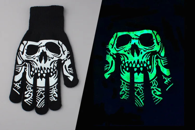 A pair of luminous green skeleton hand gloves displayed on a black background.