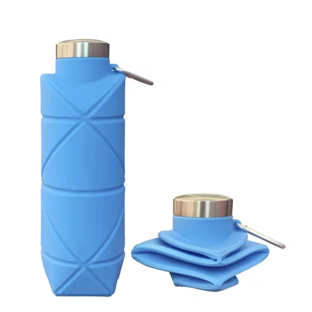 A light blue collapsible silicone travel water bottle with a silver cap, shown standing and folded.