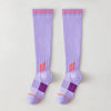 Pair of light purple graduated compression knee high socks with red trim