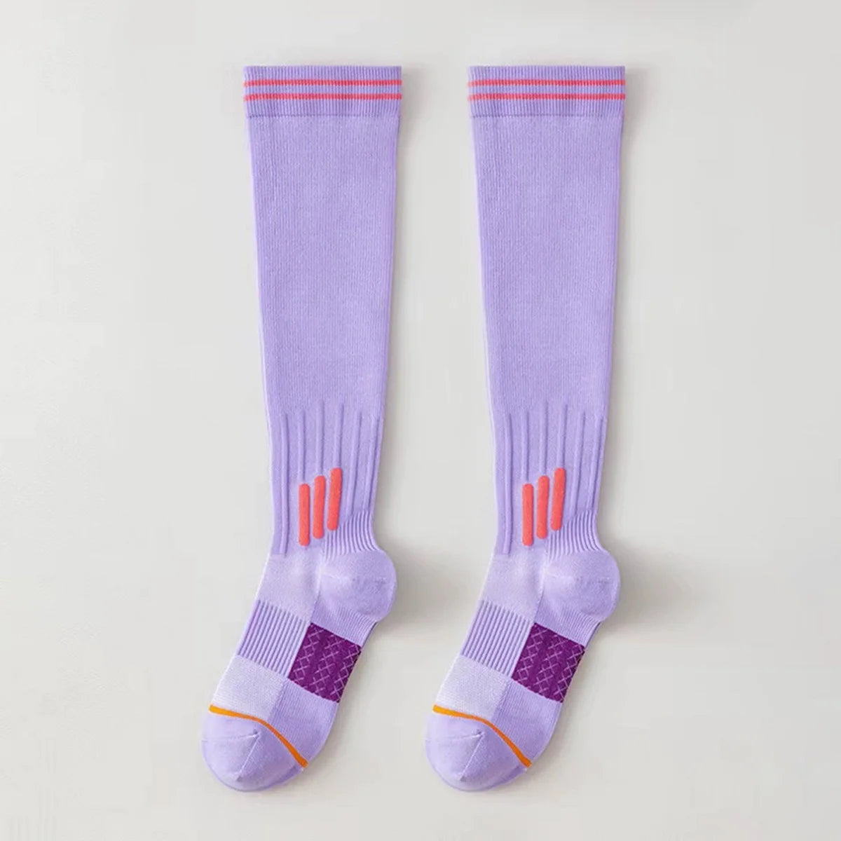 Pair of light purple graduated compression knee high socks with red trim