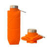 An orange collapsible silicone travel water bottle with a silver cap and clip.