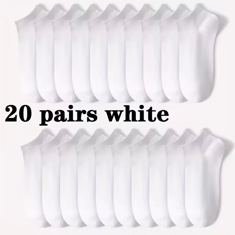 Twenty pairs of white comfort fit ankle socks arranged in a row.