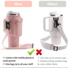 Pink adjustable water bottle carrier bag with a mobile phone pocket and strap for carrying items