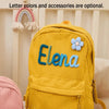 Gelöter Cordhosen-Rucksack mit dem Namen Elena und einer blauen Blume, vor hellem Hintergrund.