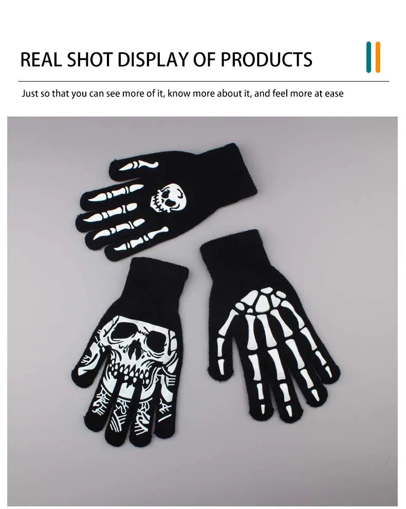 A pair of black skeleton hand gloves displayed against a white background.