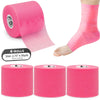 Pink athletic foam tape rolled in four individual rolls and applied to a leg.