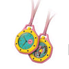 A pink and yellow octagonal candy color pocket watch pendant with a turquoise face and gold accents.