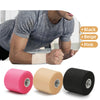 Three rolls of athletic foam tape in black, beige, and pink are shown next to a person's arm.