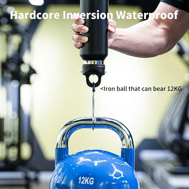 A hand holds a black thermos with an iron ball inside, demonstrating its hardcore inversion waterproof feature.