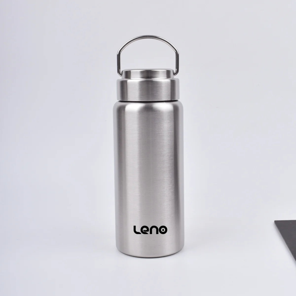 A silver stainless steel sport water bottle with a hinged cap is shown against a light gray background.
