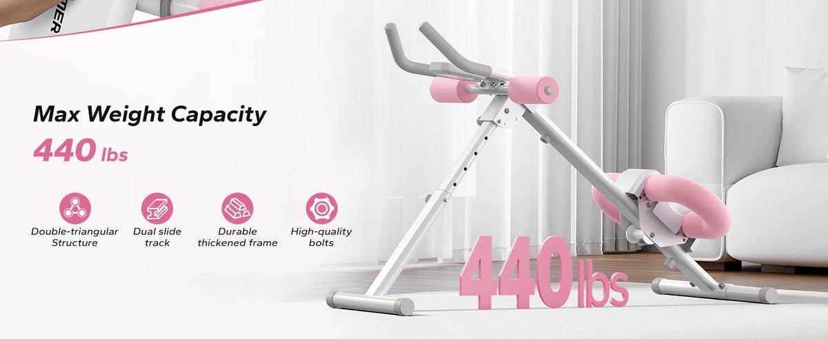 A silver adjustable core abdominal trainer with pink accents is shown on a white background.