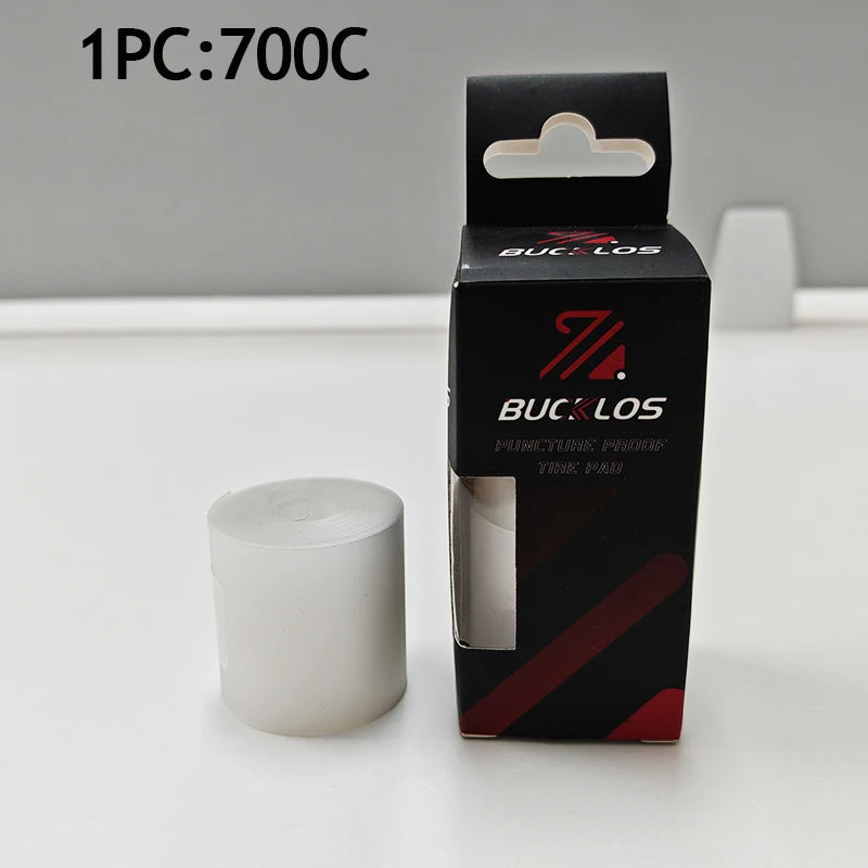 A black box containing one bicycle puncture protection liner is shown on a white surface.