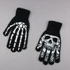 Black gloves featuring a white skeleton design on the palm and back of the hand.