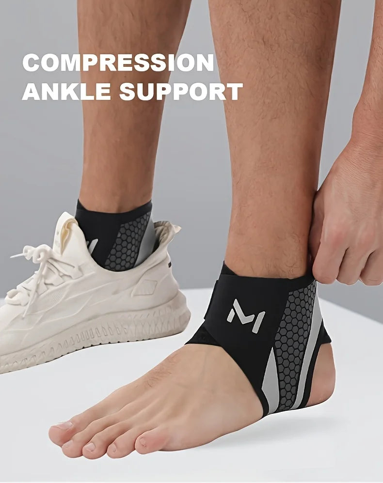 A person's ankle is supported by a black compression strap designed for ankle support.