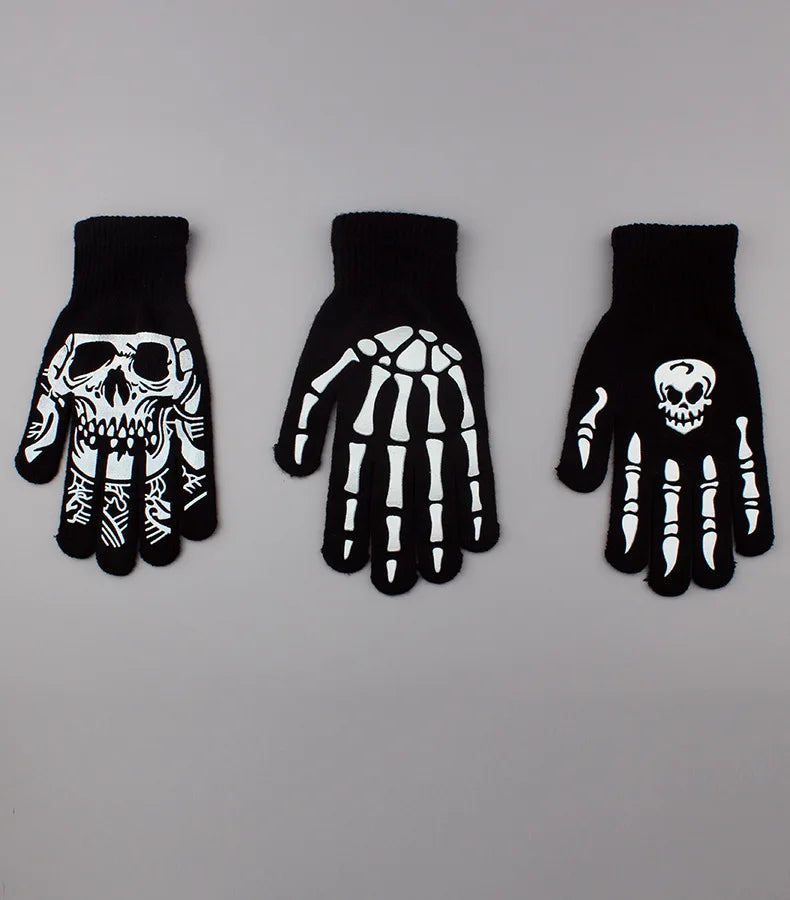 Black gloves with white skeleton designs on the palm and back of the hand