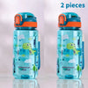 Two clear silicone water bottles with dinosaur designs and orange lids for kids