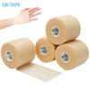Rolls of beige athletic foam tape and a hand wrapped with the tape for joint protection.