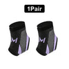 A pair of black and purple adjustable ankle compression straps.