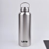 A silver stainless steel sport water bottle with a hinged cap standing upright on a white surface.