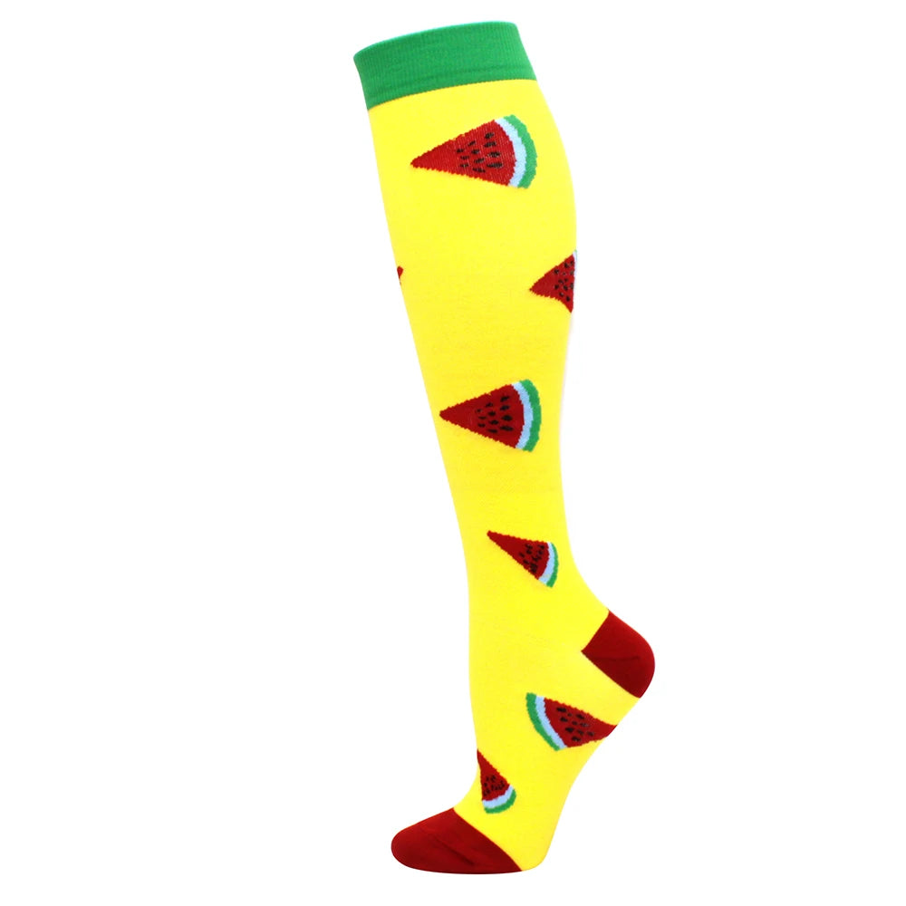 Yellow compression socks with red watermelon designs on the toes