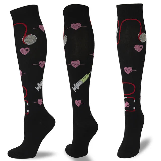 A set of multi-color compression socks featuring various heart and medical symbols on a black background.