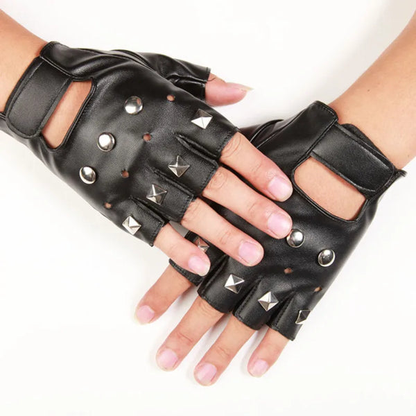 Black leather performance gloves with silver rivets and studs worn on a hand.