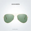 Gold and green polarized pilot sunglasses shown against a white background.