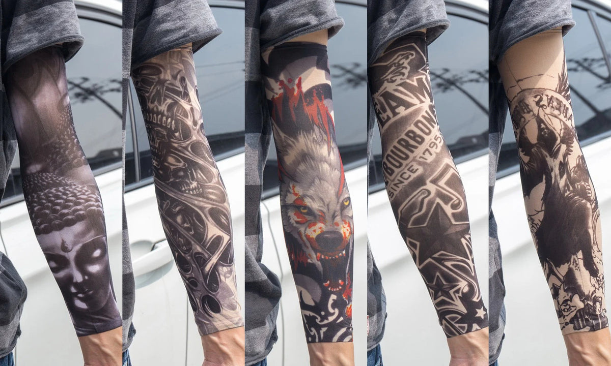A close-up of a person wearing dark gray reusable UV protection tattoo arm sleeves featuring intricate black and orange triba