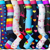 A collection of colorful compression elastic socks featuring various stripes, hearts, and rainbow colors.