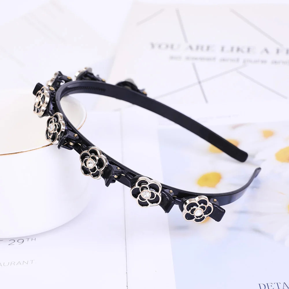 Black headband adorned with silver pearls and floral rhinestones