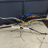 A display of several lighted arrow nocks and arrows for archery, including blue and yellow sets.