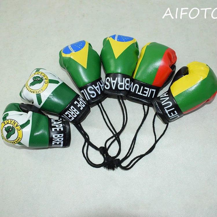 Colección de llaveros de guantes de boxeo decorativos con colores y emblemas nacionales.