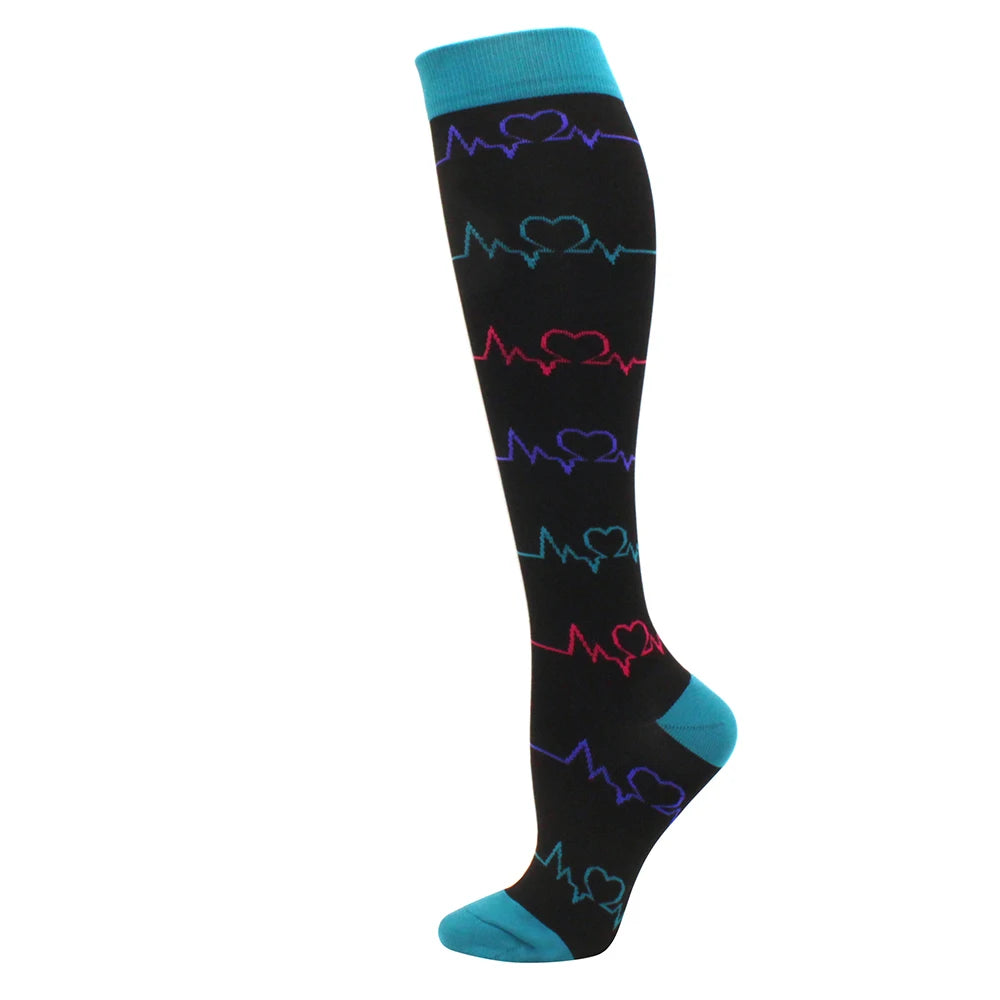 Black compression socks with a neon blue cuff and a red heartbeat line pattern.