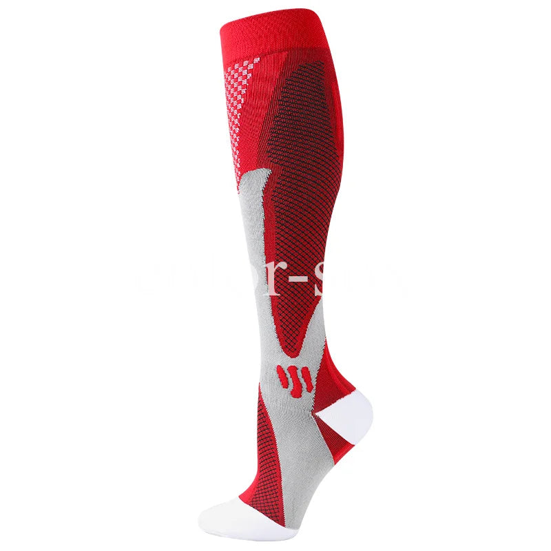 A pair of red and gray graduated compression socks for sports and recovery.