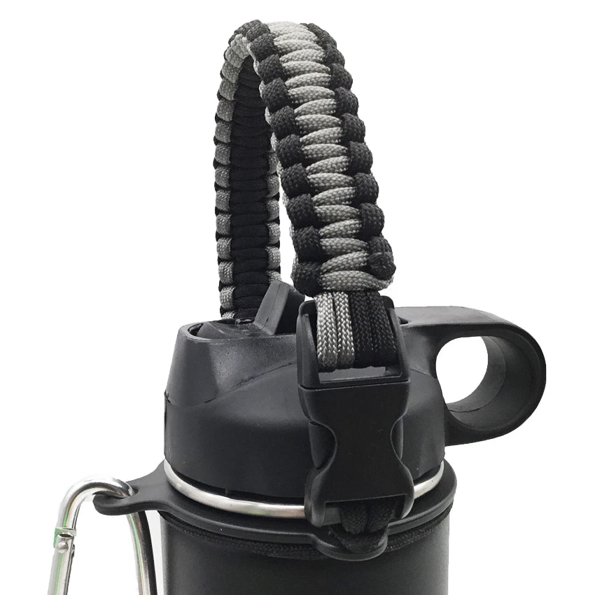 A black paracord strap is wrapped around a water bottle, used for hiking and travel.