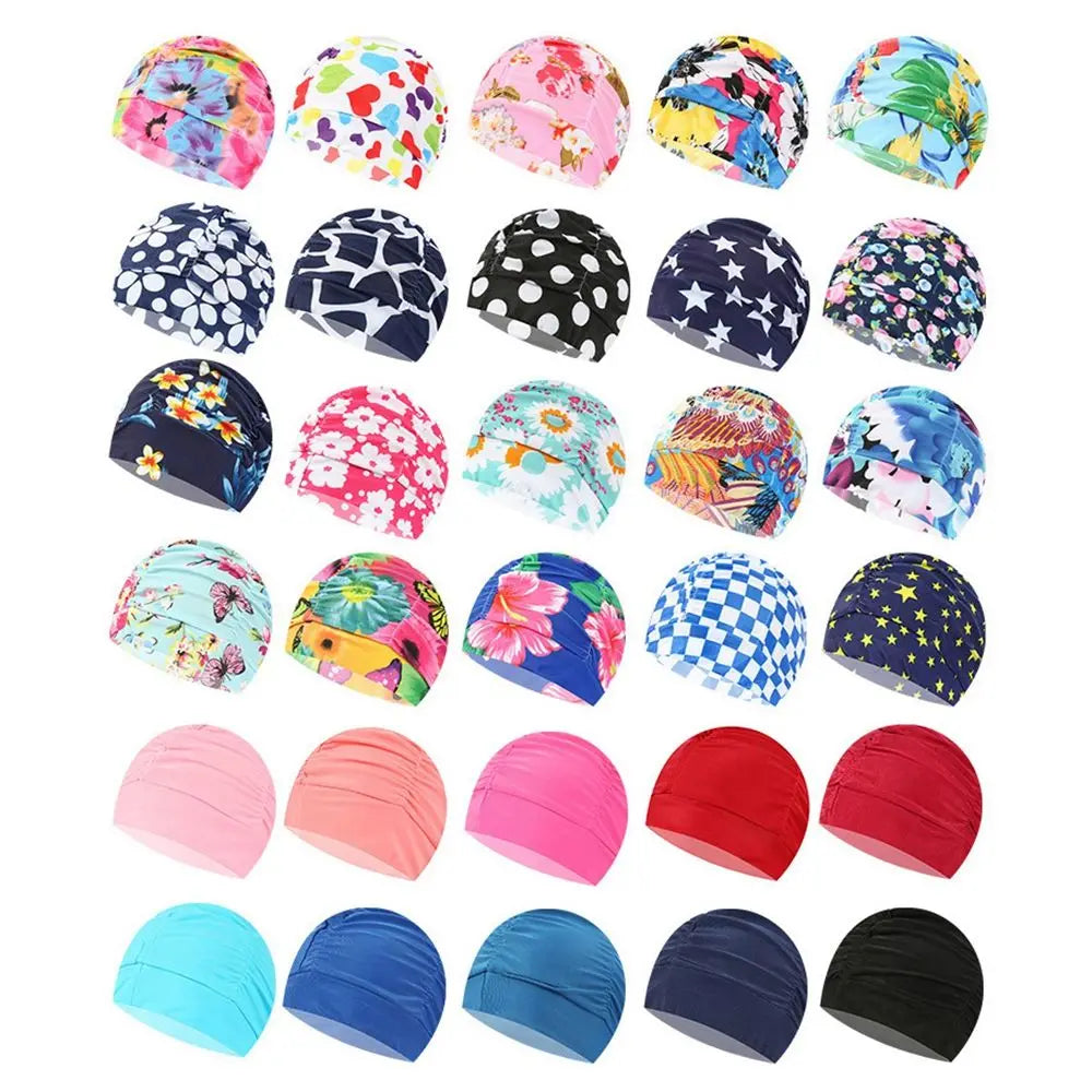 A collection of colorful elastic nylon turban swimming caps in various floral and geometric patterns.