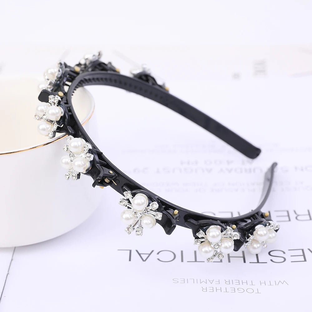 Black headband decorated with white pearls and rhinestones