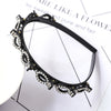 Black double layer headband adorned with sparkling pearls and rhinestones