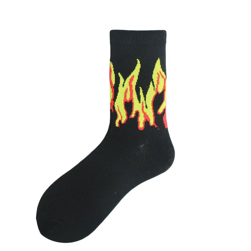 Black crew socks with a yellow and red flame pattern on the leg.