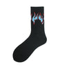 Black crew socks with a flame pattern in red and blue thread.