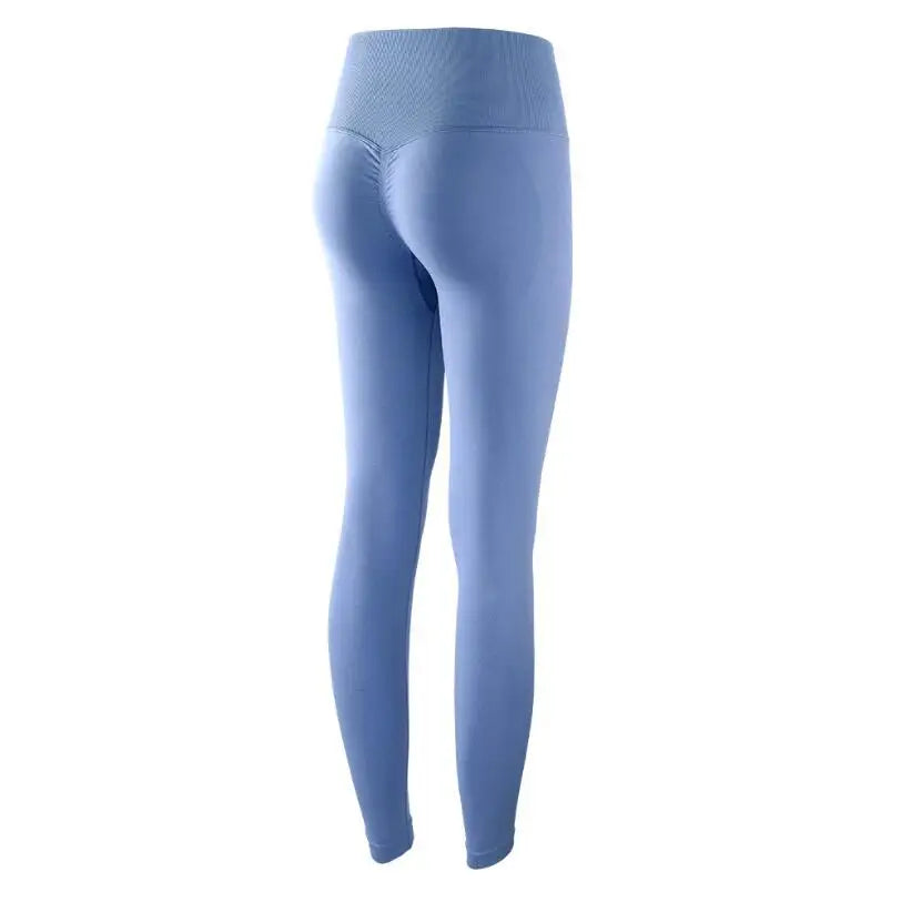 Light blue high-waist seamless yoga leggings shown from the front.