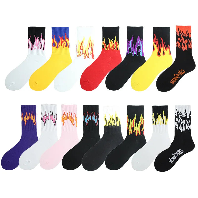 A variety of women's crew socks featuring various flame patterns in colors like purple, yellow, red, and black.