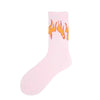 A single light pink crew sock featuring a flame pattern on the toe area.