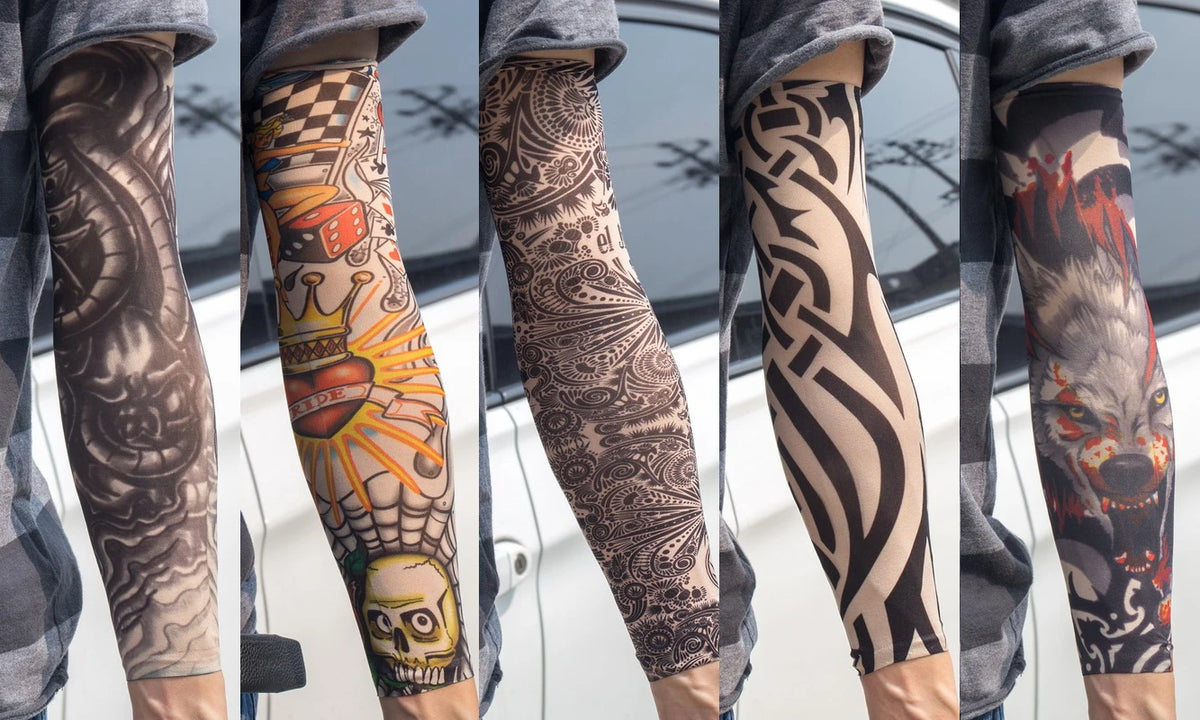 Close-up of a person wearing black and gray reusable UV protection tattoo arm sleeves on their forearm.