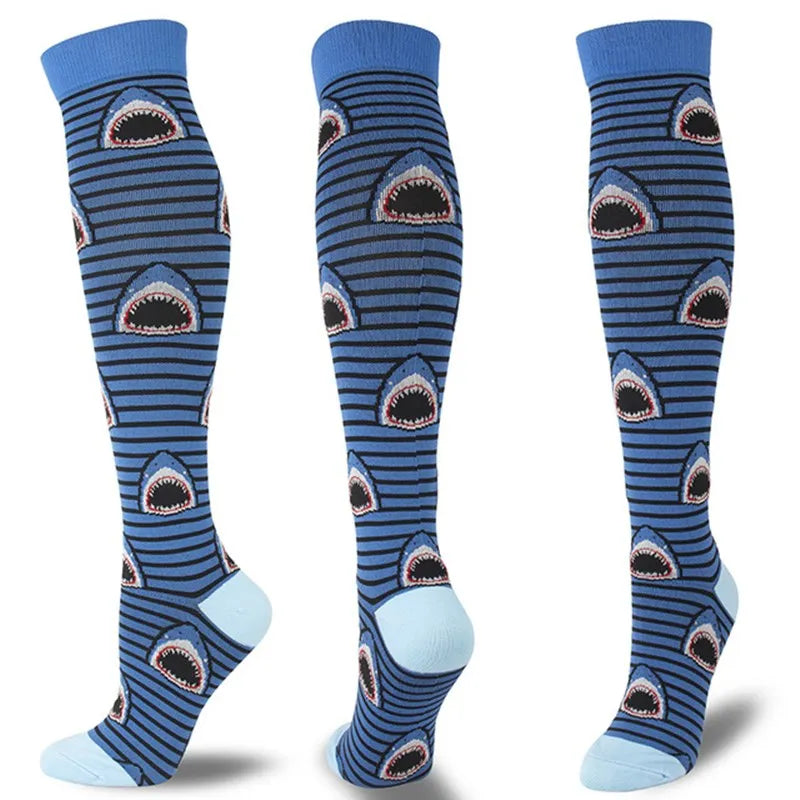 A pair of multi-color compression socks featuring a striped pattern with tooth designs.