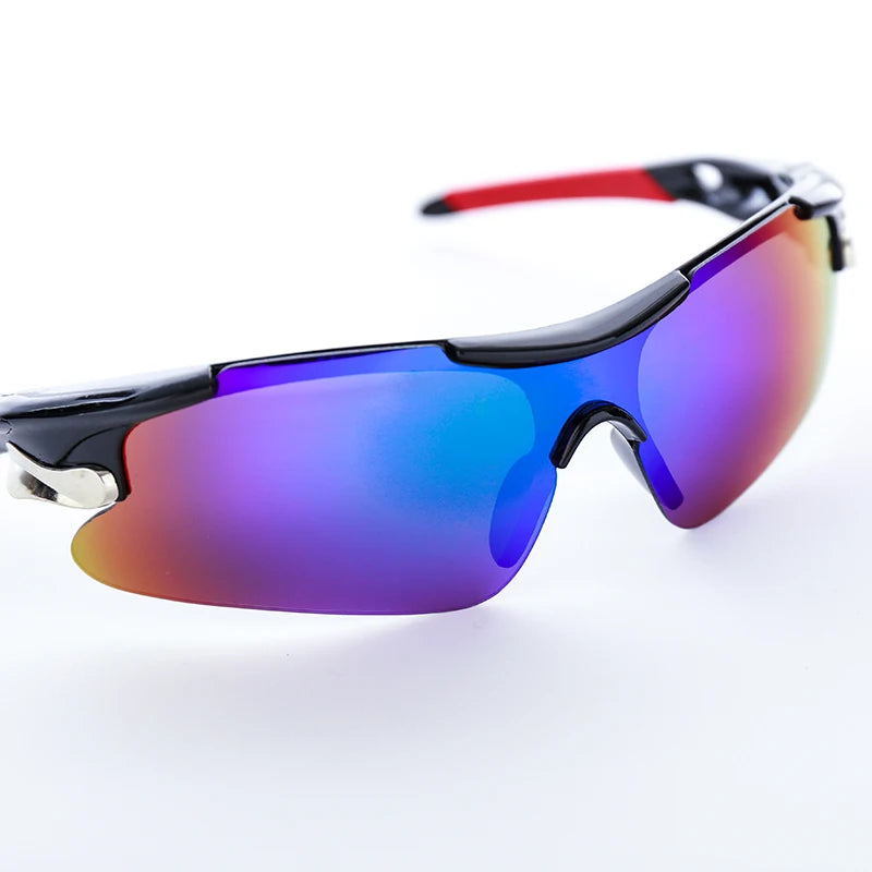Purple and blue sport sunglasses with red accents shown against a white background.