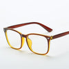 A pair of tortoiseshell square full frame optical glasses with amber lenses.