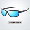 Black and blue polarized sports sunglasses shown against a light gray background.