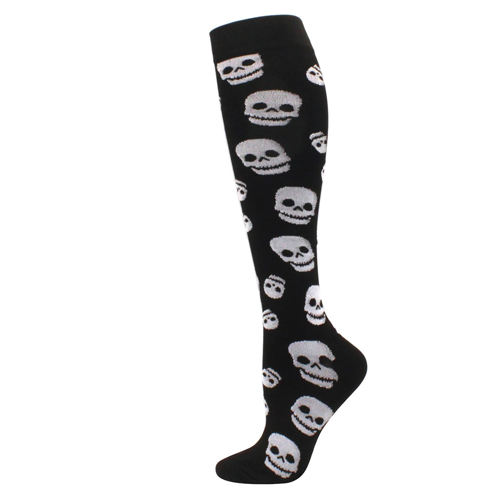 Black compression socks featuring a repeating pattern of white skulls.